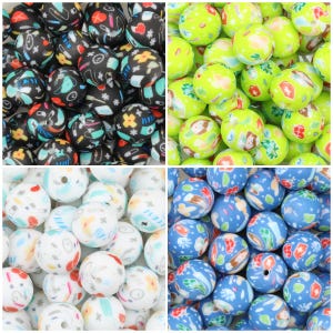 May include: A collection of round silicone beads featuring medical-themed graphics including pills, stethoscopes, and first aid symbols. The beads are presented in four distinct color palettes: black, lime green, white, and blue, each with a hole.