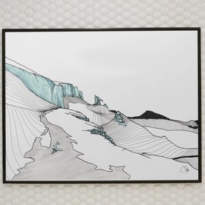 May include: Black framed art print depicting a mountain landscape illustration. The artwork uses black ink lines with grey and teal watercolour accents. The image shows a mountain range with a glacier and a river.