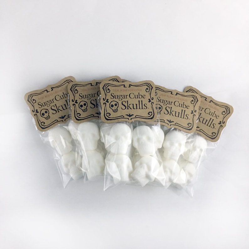 5 Bags of Skull sugar cubes on white background, Kraft labels read: DemBones Original Sugar Cube Skulls