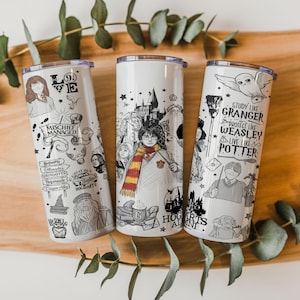 May include: Three white cylindrical tumblers with metal lids, each featuring black line art illustrations of characters and symbols from a fantasy series. Designs include text like Mischief Managed, Study Like Granger, Protect Like Weasley, and Live Like Potter.