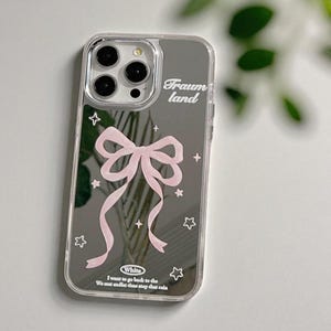 Pink Ribbon Aesthetic iPhone Case | Traumland Bow Design Soft TPU Cover | Cute Girly Phone Case with Quote