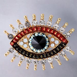 Broche de mau-olhado deslumbrante, broche de cristal Nazar em tom dourado, amuleto de proteção, joia de declaração exclusiva, strass