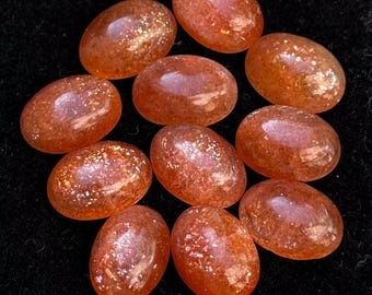 AAA + Sonnenstein Cabochon: Ovaler Edelstein, kalibrierter flacher Edelstein