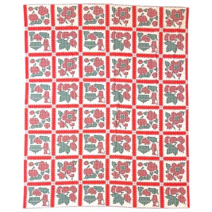 May include: A rectangular fabric tablecloth featuring a repeating grid pattern of red and white gingham apples and green and white gingham pears. The squares are separated by solid red bands with a scalloped edge on a cream-coloured background.