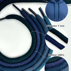 Puede incluir: Primer plano de varios cordones de algodón azules y verdes, de 7 mm de diámetro, adecuados para sudaderas con capucha. Los cordones son de varios tonos de azul y verde, con un primer plano que muestra el tejido de algodón. El texto de la imagen dice "Great for hoodies" y "Cotton 100%."