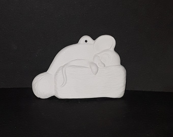 Mouse sleeping on Santa's hat