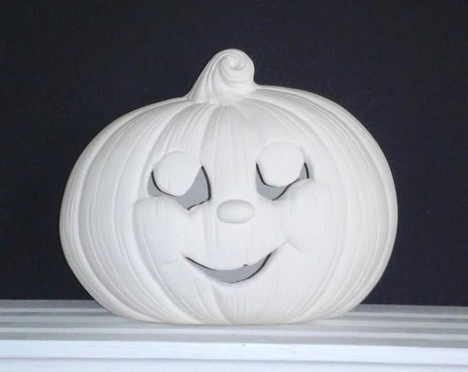 Ceramic Bisque smiling  Pumpkin.  U-Paint