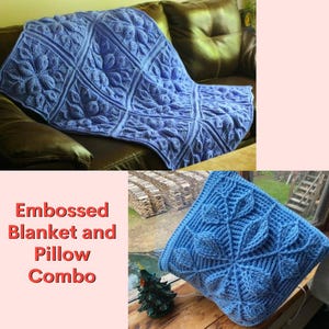 May include: A blue embossed blanket and pillow combo. The blanket is draped over a brown leather couch. The blanket and pillow have a raised floral design. The text "Embossed Blanket and Pillow Combo" is in the image.