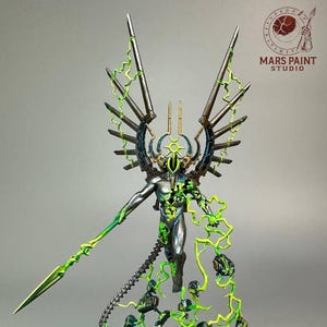 May include: A metallic silver figurine of a humanoid figure with a spear and elaborate wings. The figure is adorned with neon green energy effects and stands on a black base. The Mars Paint Studio logo is in the upper right corner.