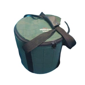 May include: A green Crock-Pot Travel slow cooker carrier with a black zipper, handle, and shoulder strap. The carrier is cylindrical with a flat top and bottom. The text "Crock-Pot Travel" is printed on the top.