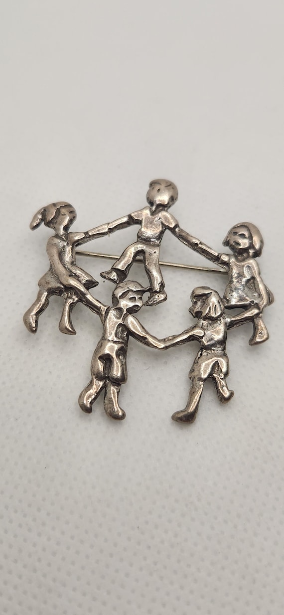 Sterling Children holding Hands Pin Marked and Sig