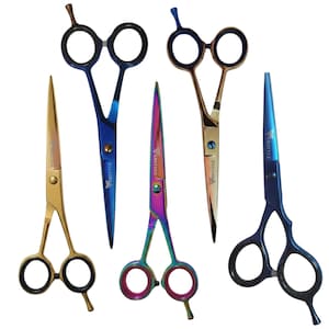 May include: A collection of five professional hair cutting shears in various metallic finishes including gold, blue, iridescent rainbow, and bronze. Each pair of scissors features a finger rest, adjustable tension screw, and the brand name Verstyle.