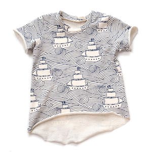 Edgy tee sewing pattern for babies and toddlers, sizes from 0-3m to 5-6T, pattern 106 includes layers