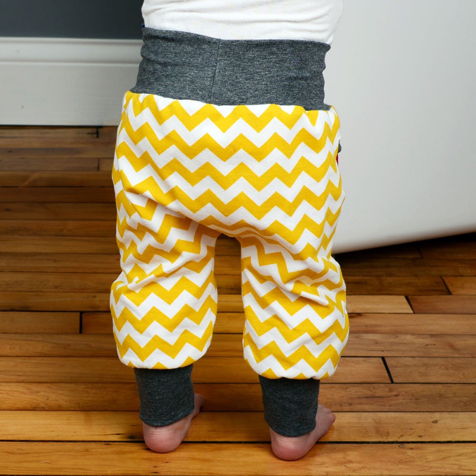 Sewing pattern for baby pants with cuffs and faux pockets // Etsy