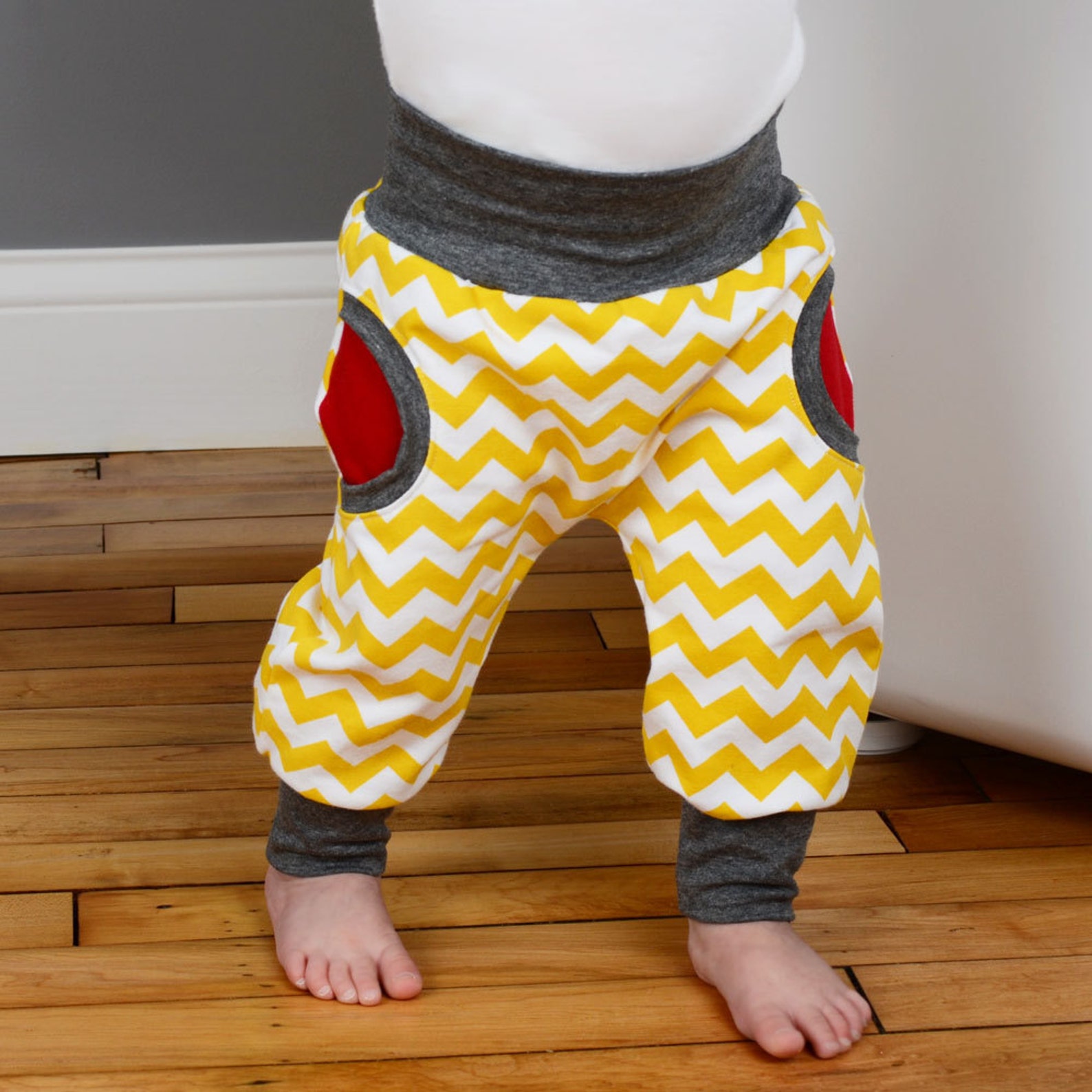 Sewing pattern for baby pants with cuffs and faux pockets // Etsy