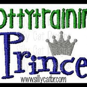 May include: An embroidered design with the words "Pottytraining Prince" in green and blue, with a silver crown graphic. The website address www.sillycatbr.com is at the bottom.