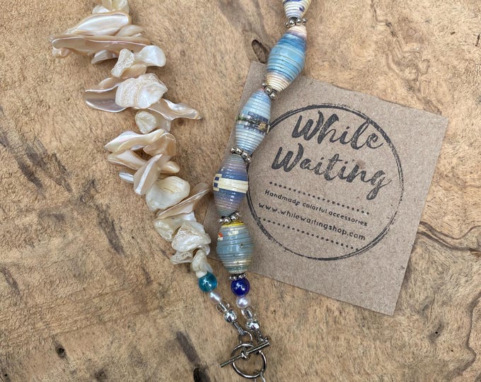 Shell and paperbead necklace- front clasp/ freshwater Pearl pendant