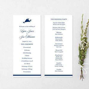 May include: A wedding ceremony program with a navy blue and white color scheme. The program lists the order of events for the wedding ceremony of Lyra Jones and Jon Wanrem, which will take place on August 27, 2021. The program also includes a list of the wedding party members.