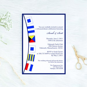May include: A white invitation with a navy blue border featuring nautical flags. The invitation is for a rehearsal dinner for Sarah & Scott on Thursday, June 2, 2011 at 5:00 PM at the Falmouth Yacht Club. The wedding rehearsal will precede dinner at 3:00 PM at the Popponesset Inn.