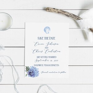 May include: Save the date card with a blue seashell and hydrangea flowers. The card reads "Save the Date, Erica Johnson and Chris Eccleston, Are Getting Married, September 16, 2017, Sandwich, Massachusetts, Formal invitation to follow."