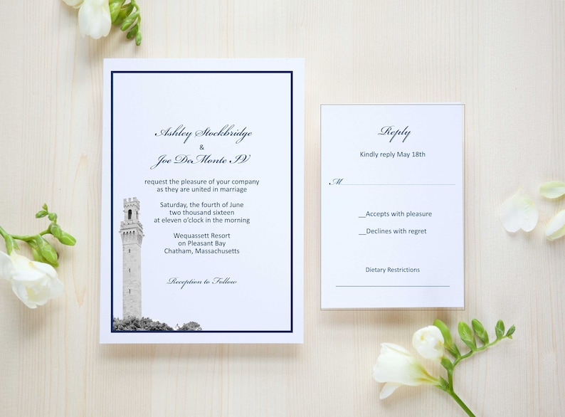May include: Wedding invitation with a black and white photo of a lighthouse on a white background with navy blue trim. The invitation text reads "Ashley Stockbridge & Joe Da Monte IV request the pleasure of your company as they are united in marriage Saturday, the fourth of June two thousand sixteen at eleven o'clock in the morning Wequassett Resort on Pleasant Bay Chatham, Massachusetts Reception to Follow". The RSVP card reads "Reply Kindly reply May 18th Accepts with pleasure Declines with regret Dietary Restrictions".