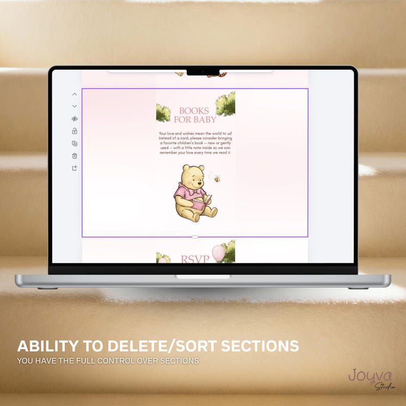 May include: A laptop screen shows a baby shower invitation design. The invitation includes a Winnie the Pooh illustration, the text "BOOKS FOR BABY", and other details. The laptop is on a light-coloured surface.