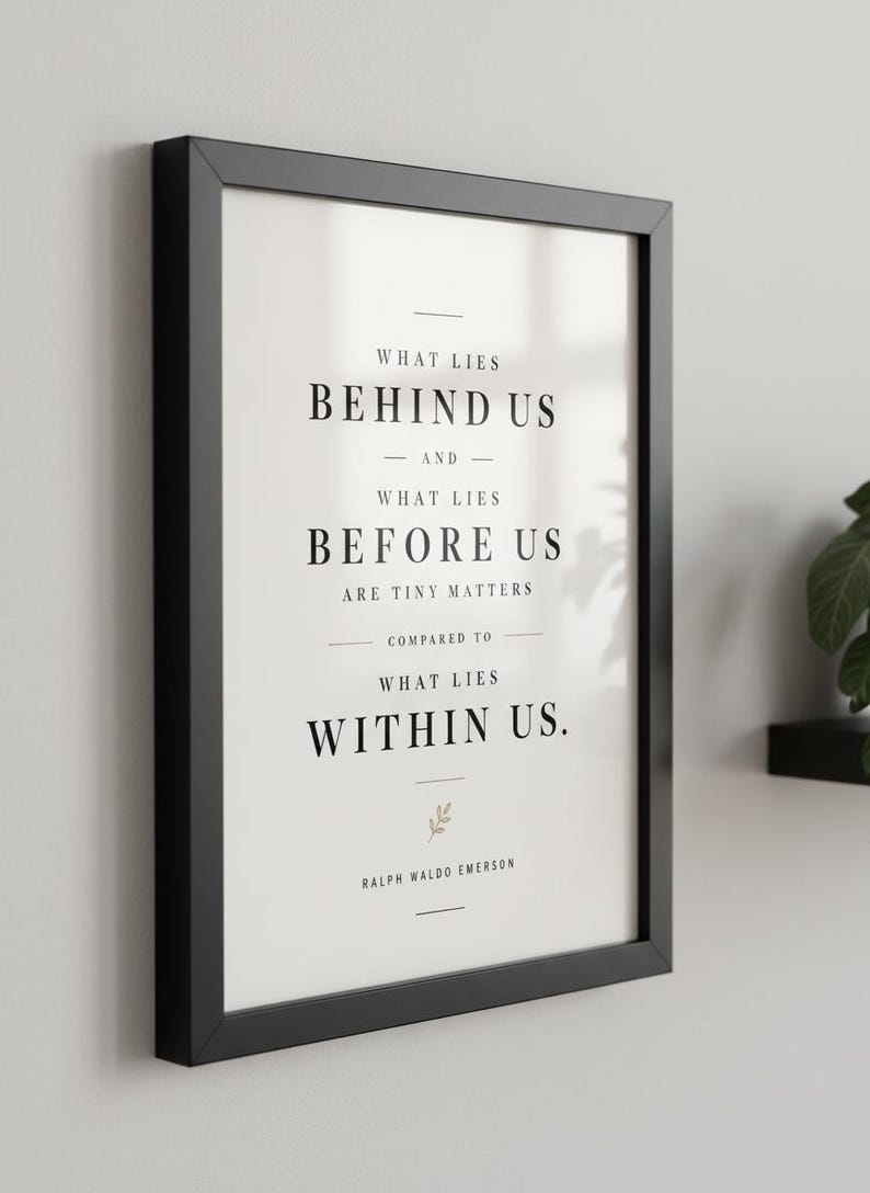 May include: Black framed print with the quote "What lies behind us and what lies before us are tiny matters compared to what lies within us." by Ralph Waldo Emerson. The text is in a clean, modern font on a white background.