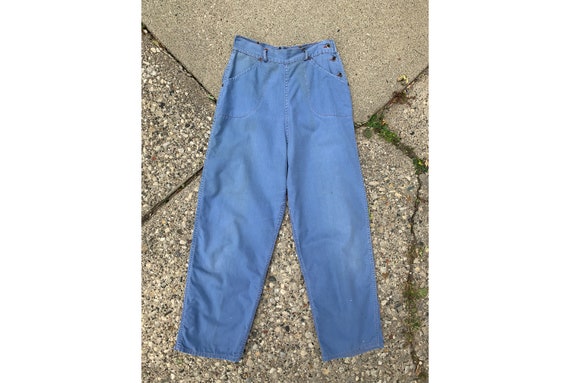 jeans with buttons on side