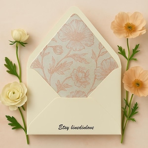 May include: An open cream-colored envelope with a floral pattern lining. The envelope is surrounded by peach-colored flowers and greenery. The text "Etsy linedinlove" is printed on the bottom of the envelope.