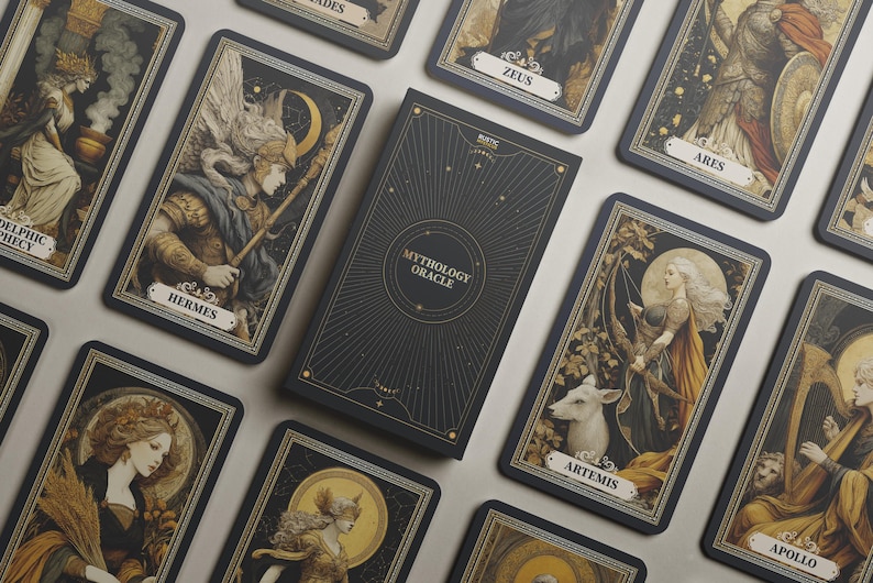 May include: A deck of Mythology Oracle cards with a black box featuring gold accents and the text "Mythology Oracle." The cards depict illustrations of Greek gods and goddesses, including Hermes and Artemis, in a vintage style.