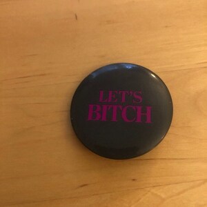 negro "vamos a perra" botón / pin