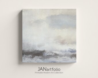 Puede incluir: Impresión artística en lienzo cuadrado que representa un paisaje abstracto con un cielo nublado y agua. La paleta de colores incluye tonos de gris, blanco y azul. El texto "JANartfolio Printable Modern Art Collection" está en la parte inferior.