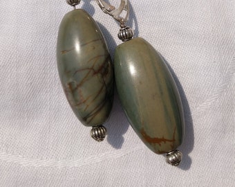 deep green blue picasso jasper barrel bead earrings with silver accents on sterling silver wires and lever backs