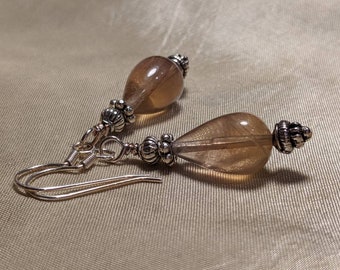 yellow fluorite teardrop bead earrings with bali silver accents and sterling silver ear wires