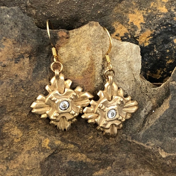 Historically inspired dangles with cubic Zirconian