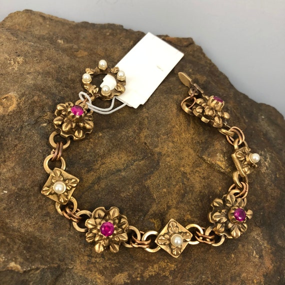 Historically inspired hand carved bronze bracelet with rubies