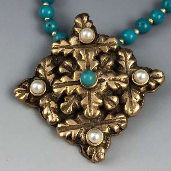 Historically Inspired bronze pendant necklace. 18 inches in length