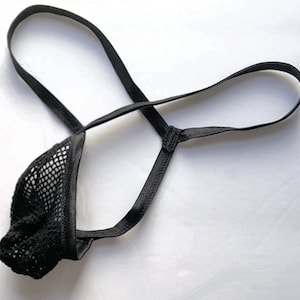 May include: Black mesh and satin lingerie with adjustable straps.