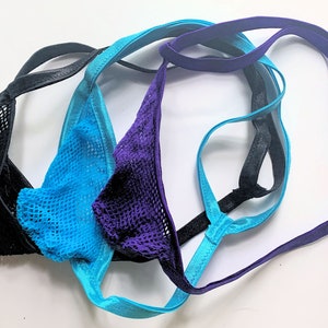 May include: Three pairs of lingerie with mesh fabric. One pair is black, one is blue, and one is purple.