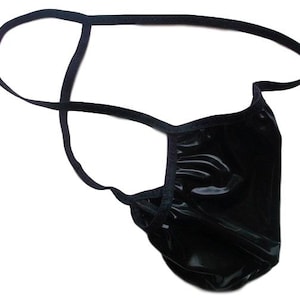 May include: Black shiny lingerie with a thin strap design.