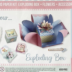 Puede incluir: Un kit de manualidades en papel 3D rosa y azul con las palabras "Daydream 3D Paper Kit" y "Exploding Box" en la parte delantera. El kit incluye una variedad de piezas de papel, flores y accesorios para crear una caja única y hermosa.