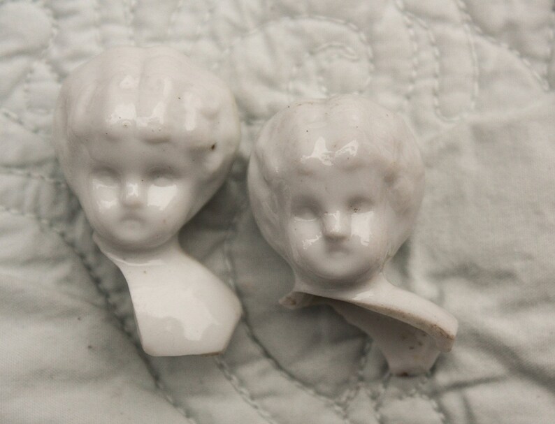antique china doll heads