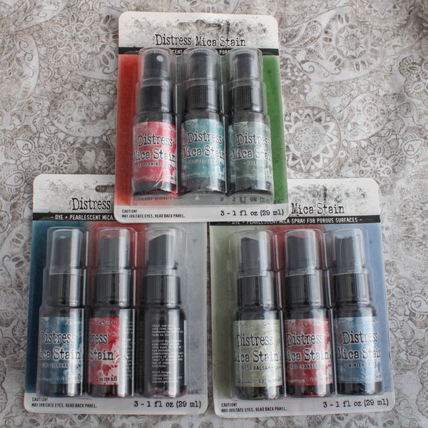 Sets of 3 mica colors in one ounce spray bottles. Tim Holtz Distress blues reds silver