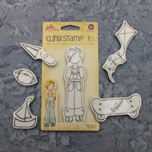 Julie Nutting Toby Doll Cling Stamp and all his favorite activities