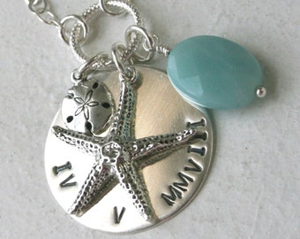 the duxbury necklace - custom date in roman numerals, hand stamped on sterling silver disk, with starfish and sand dollar on sterling chain