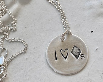 I "heart" black diamonds (ski) sterling silver charm necklace.