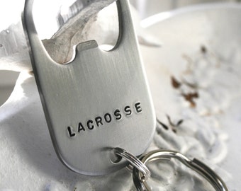 personalize this stainless steel dog tag bottle opener, team name, number, sport, coaches name etc...