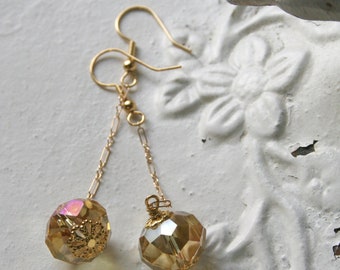 gold drop crystals on delicate gold chain holiday earrings.