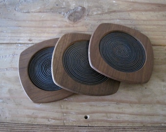 Three Original Mid Century Scandinavian Modern Coasters with Spiral paper centers, excellent condition.