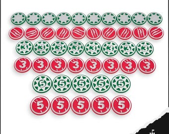 May include: A collection of game tokens in various designs. The tokens are round with white, red, and green accents. Some feature star patterns, while others display the numbers 3 and 5. The image includes the Keep Design logo in the bottom right corner.
